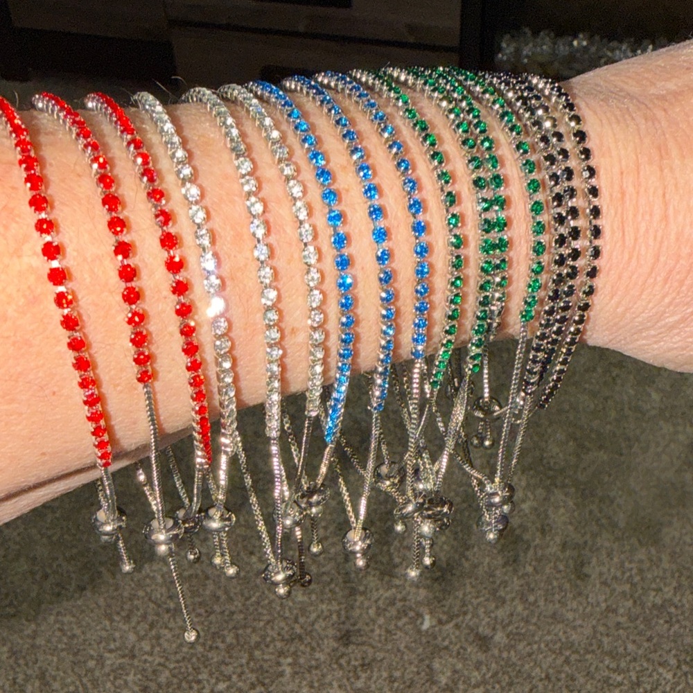 Multiple colors. Silver tone. Adjustbl Bracelet slide clasp.16 total